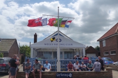 WSC clubhouse with flags flying